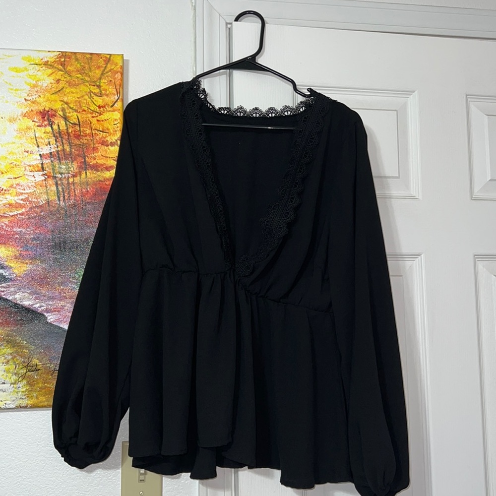 Brand new long sleeve blouse.